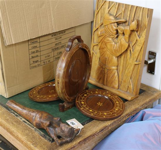 A figural carving novelty nutcrackers and inlaid cake stand.